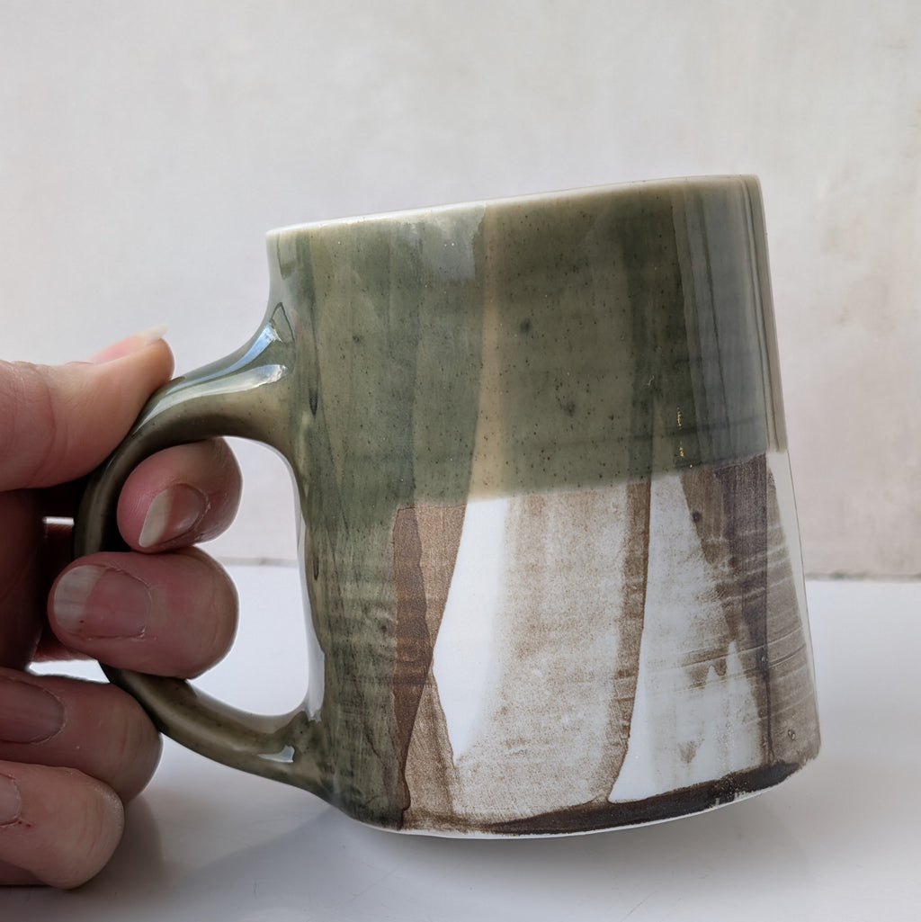 Small mug, brush strokes and exposed porcelain with Sage