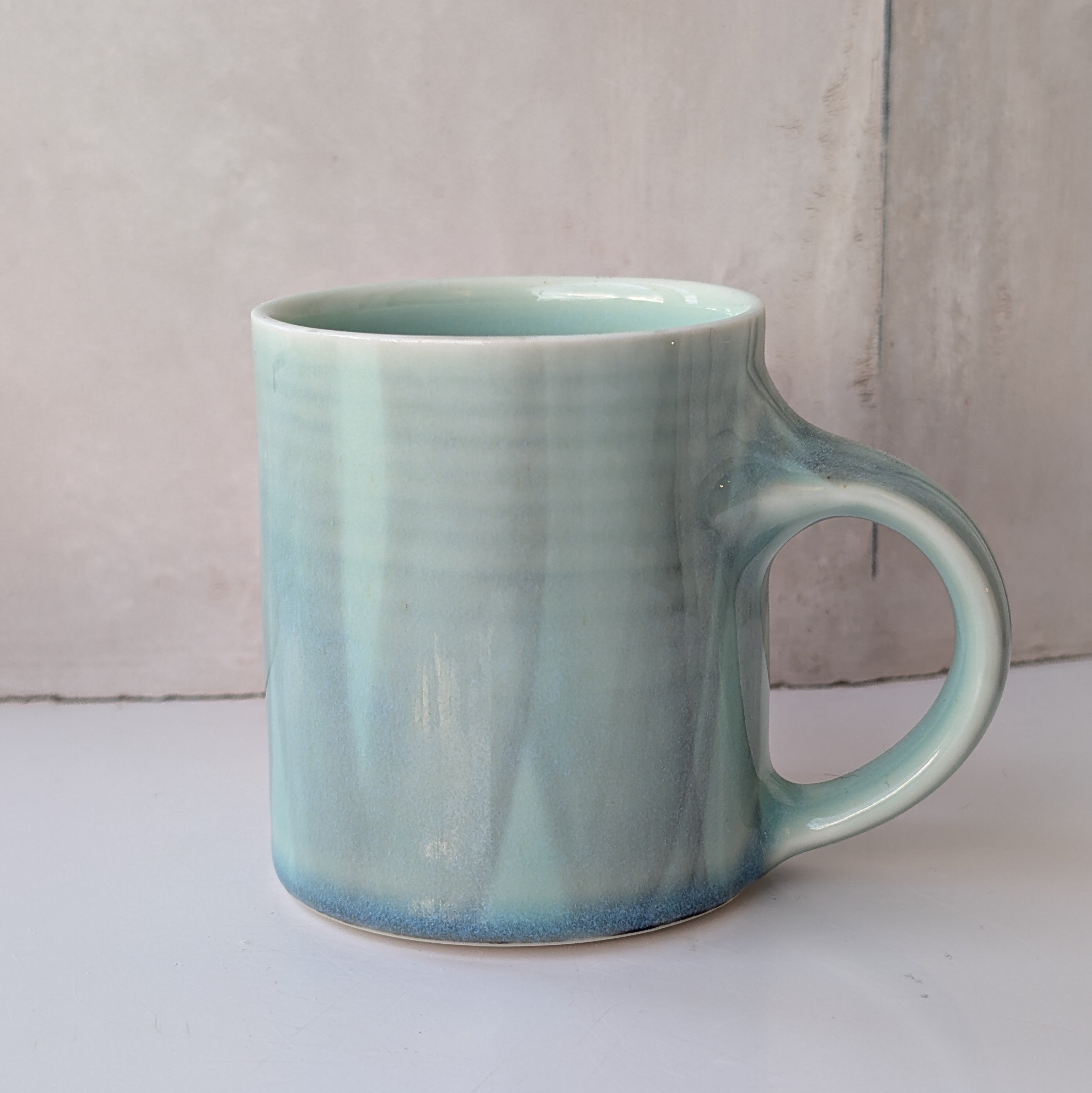 Small mug with muted brush strokes - aqua