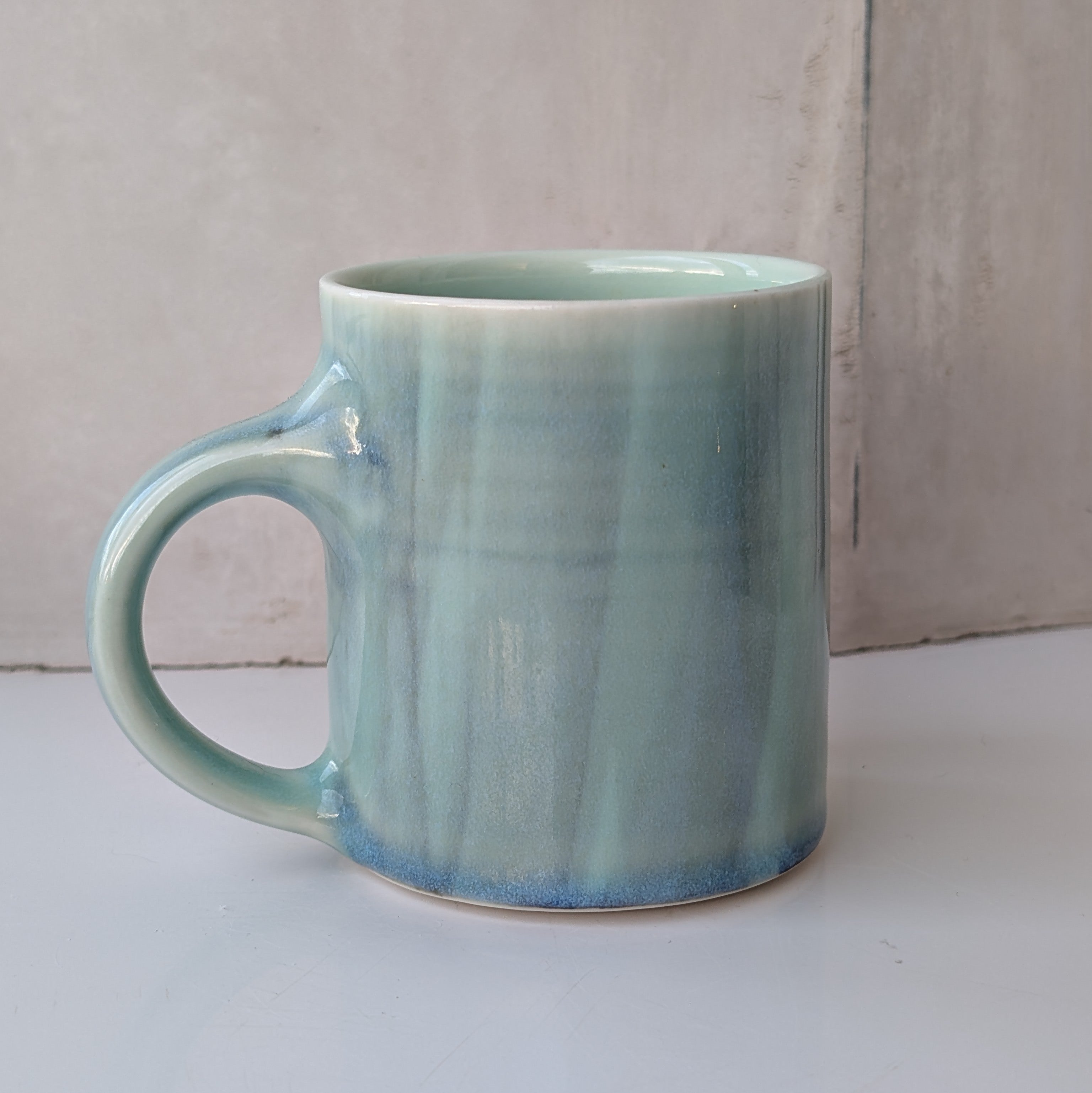 Small mug with muted brush strokes - aqua