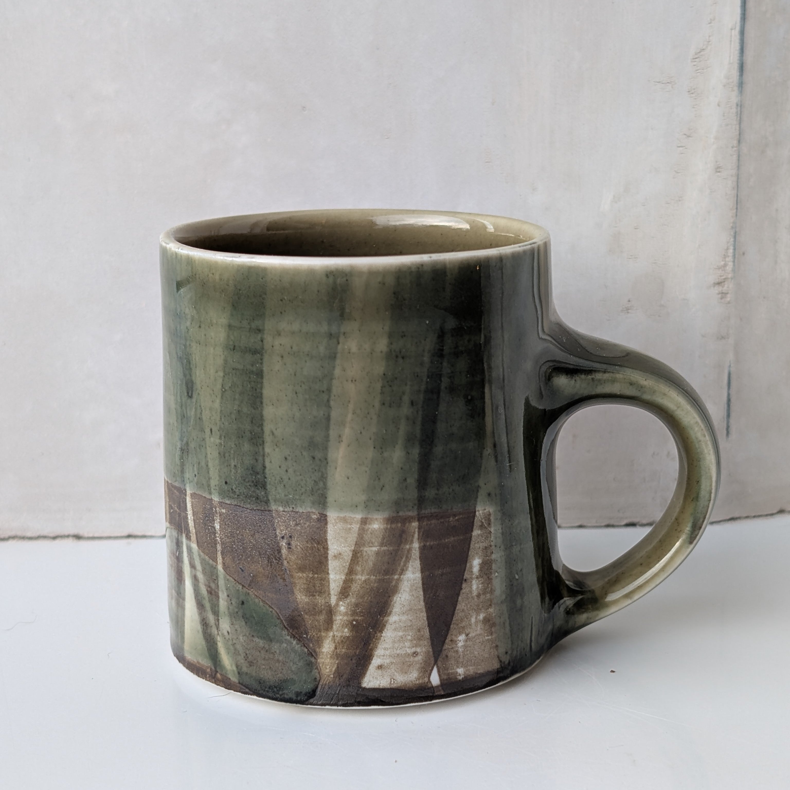 Small mug, brush strokes and exposed porcelain with Sage #2