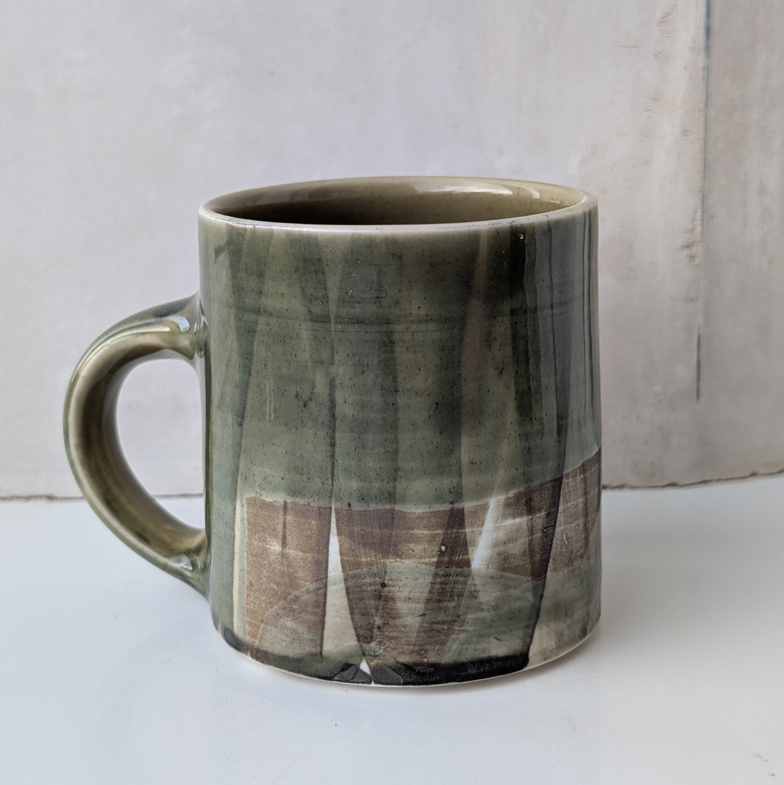 Small mug, brush strokes and exposed porcelain with Sage #2